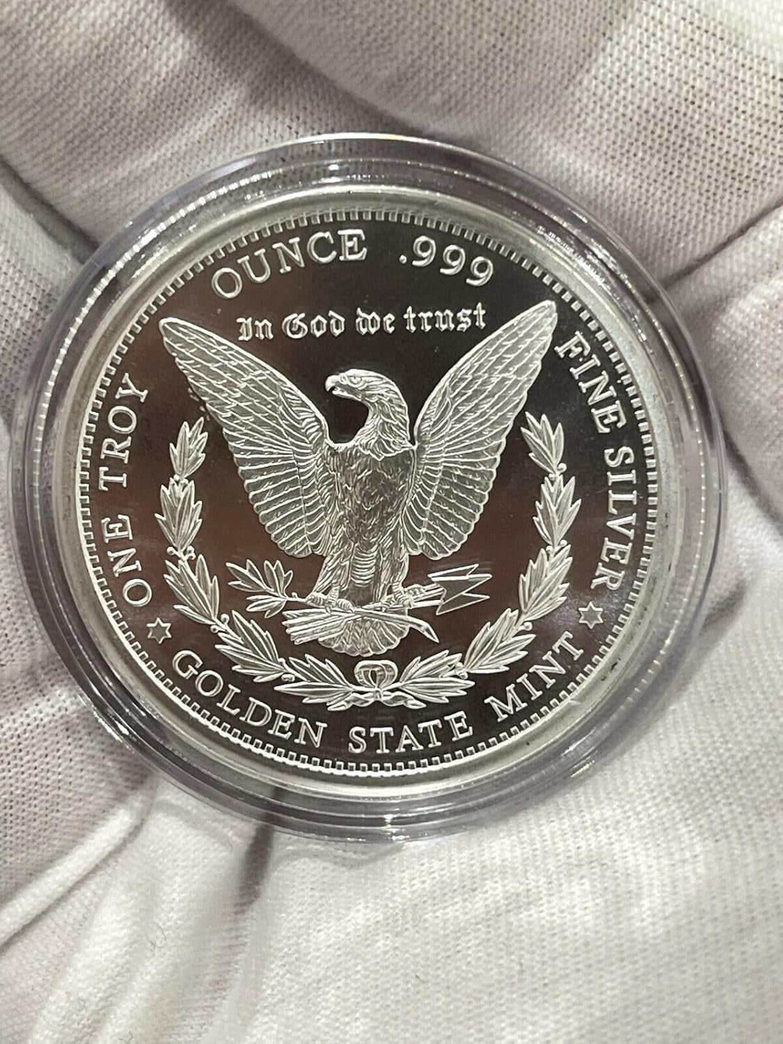 1 Oz Silver Morgan Circle round in Capsule