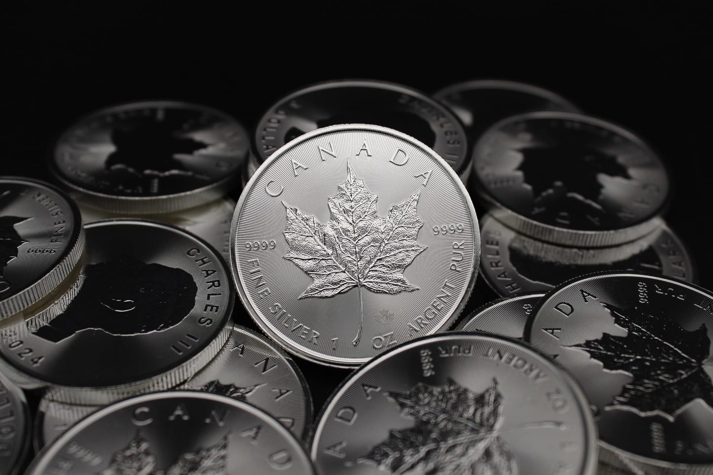 Investment Opportunity: Lot of (5) 1 oz Silver Maple Leaf Coins BU with COAs”