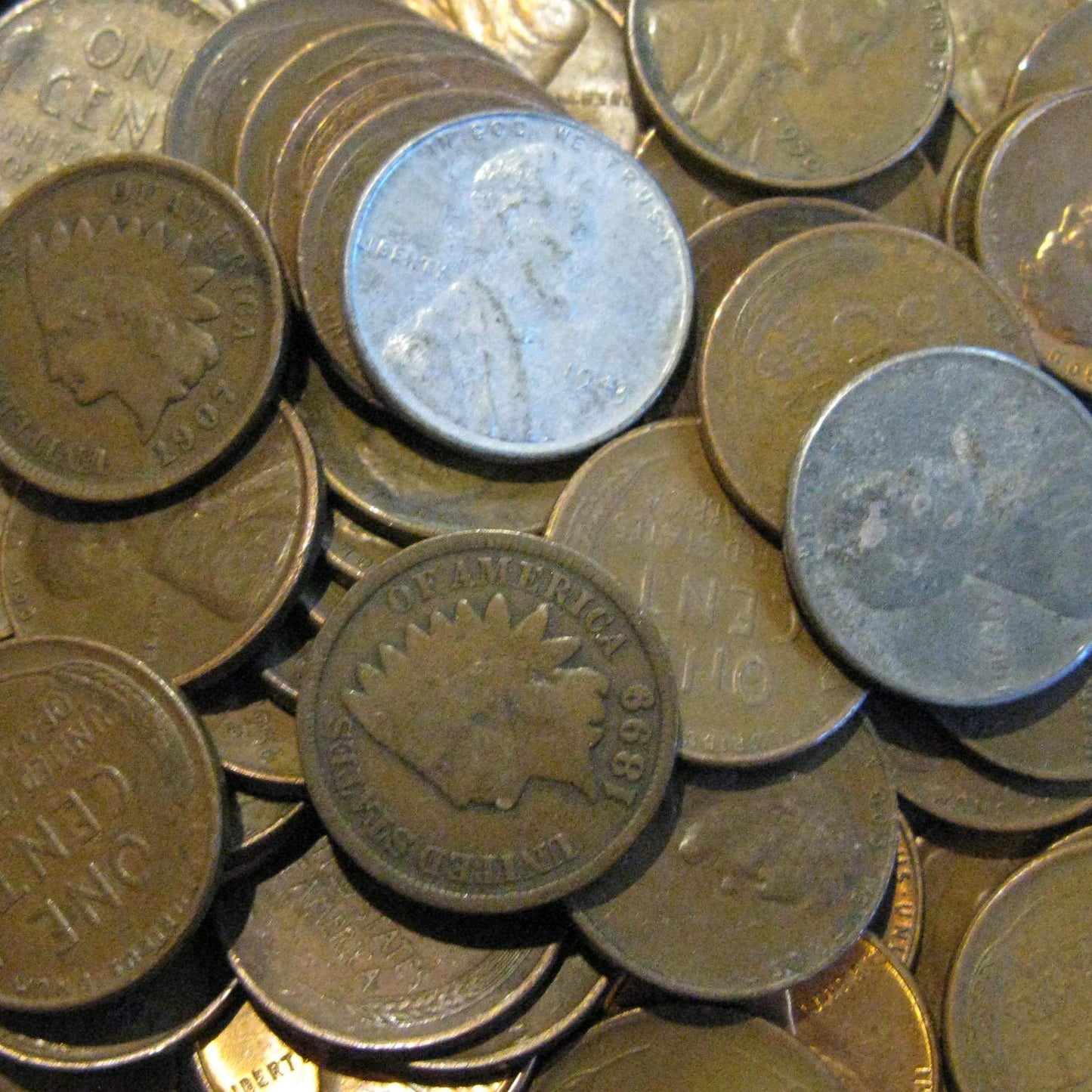 50 Old Coins with 46 Lincoln Wheat Pennies, 2 Indian Head Pennies and 2 Steel Wheat Pennies.