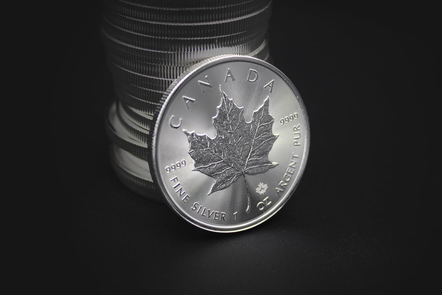 Investment Opportunity: Lot of (5) 1 oz Silver Maple Leaf Coins BU with COAs”