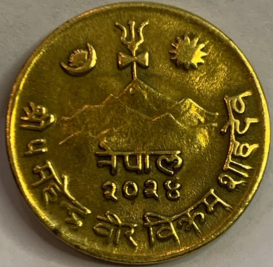 Rare Nepal 10 Paisa Coin 2024 (1967) – Brass Treasure from the Reign of King Mahendra!”