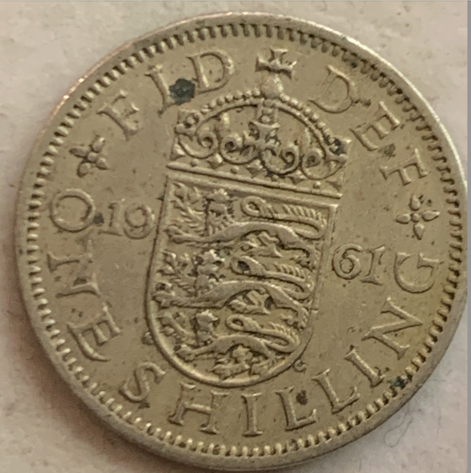 Rare United Kingdom 1 Shilling Coin - English Arms, Three Lions on Crowned Shield: A Piece of British History"**