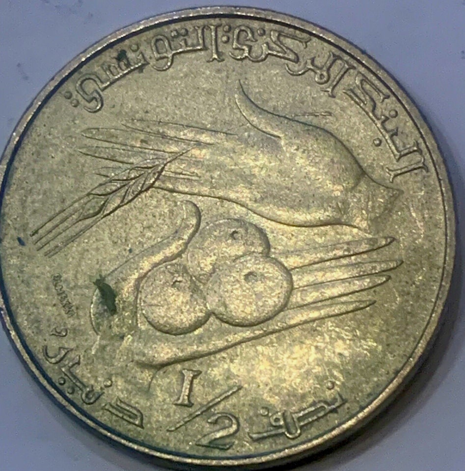 Own a Piece of Tunisian History: Commemorative 1/2 Dinar Coin from 1976