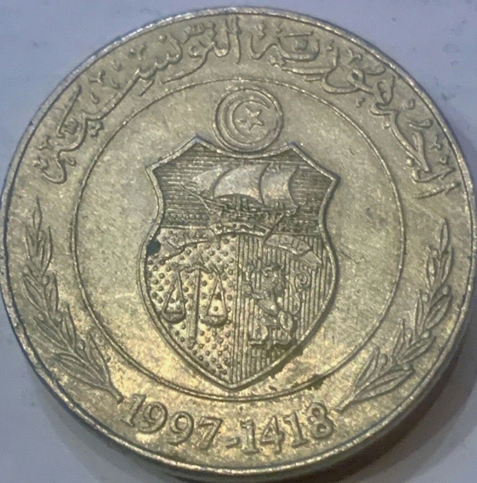 Own a Piece of Tunisian History: Commemorative 1/2 Dinar Coin from 1976