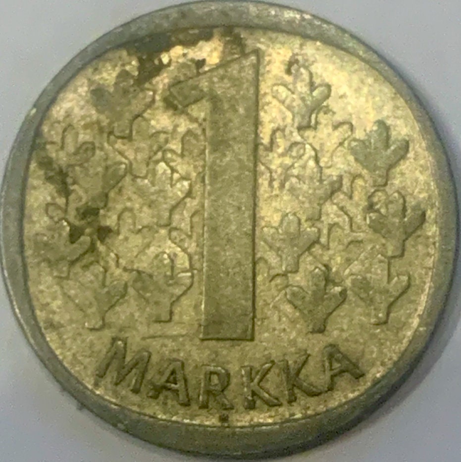 Silver Echoes of Finnish History: The Finland 1965 1 Markka Coin"