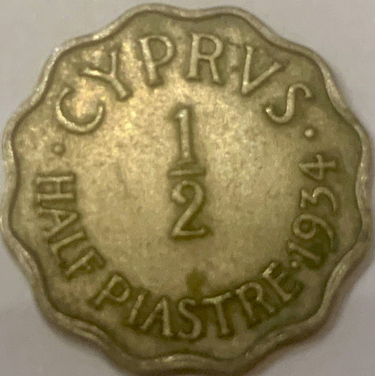 Rare Gem of the Mediterranean: 1934 Cyprus Half Piastre Coin"