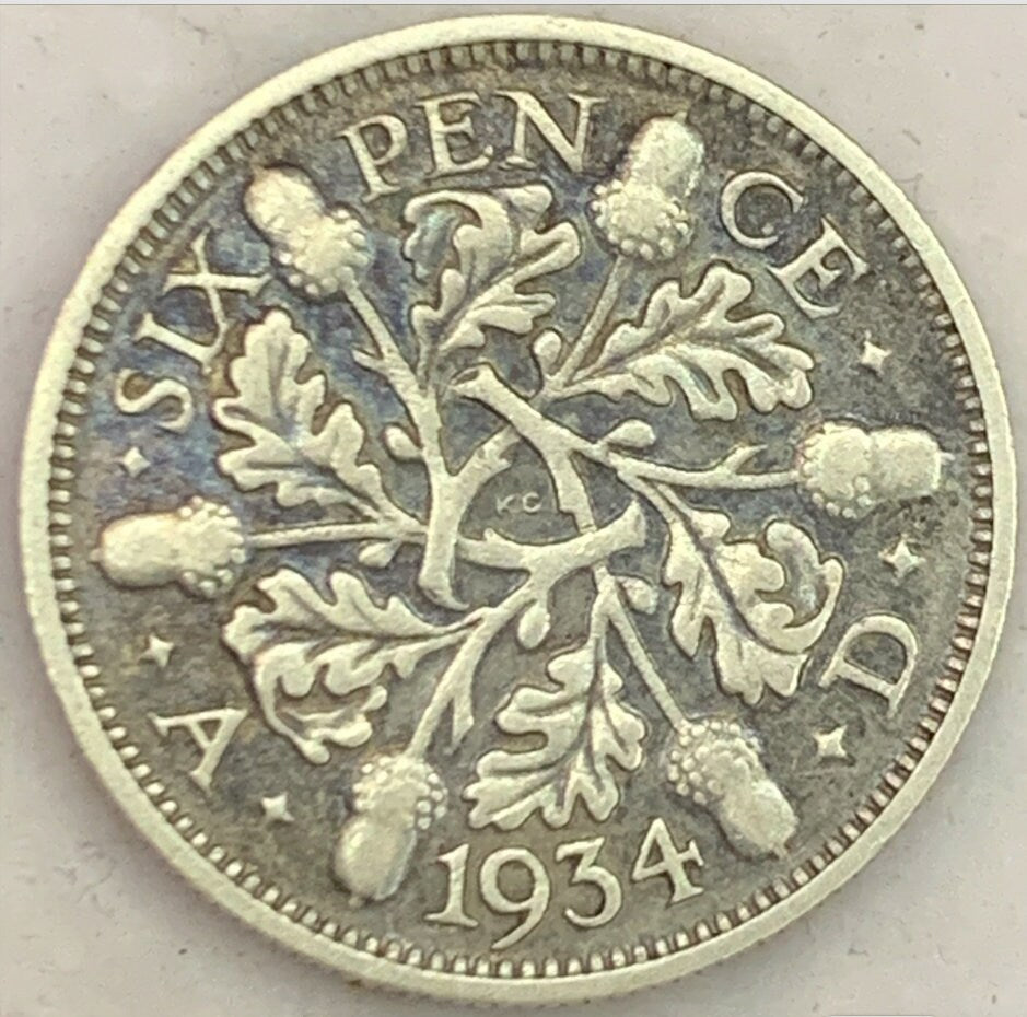 1958 and 1956 United Kingdom 6 Pence: A Glimpse into Royal History"