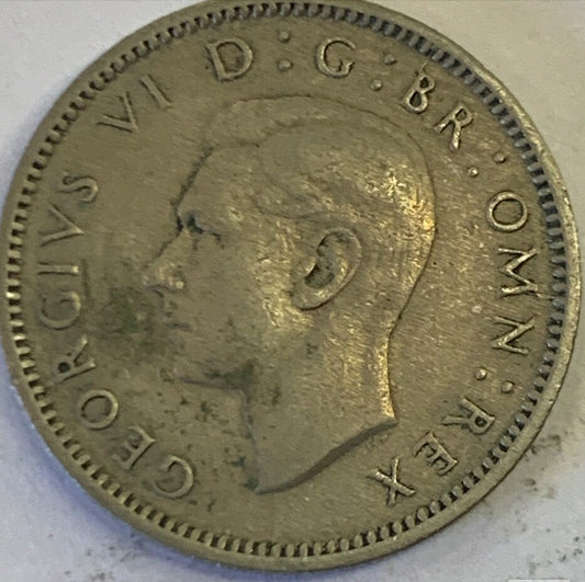 Royal Heritage: Acquire the Rare UK 6 Pence, 1948 Coin!"